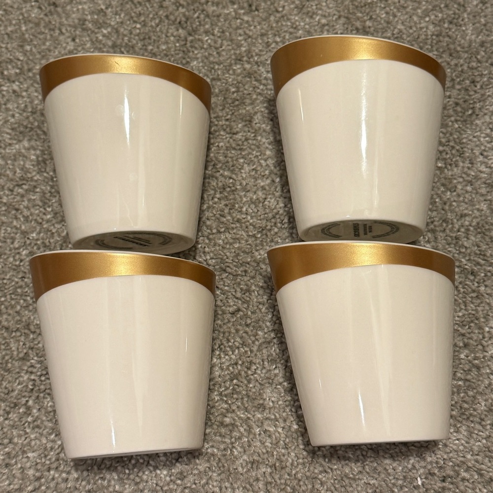 Set of Four Gold and Cream Cups